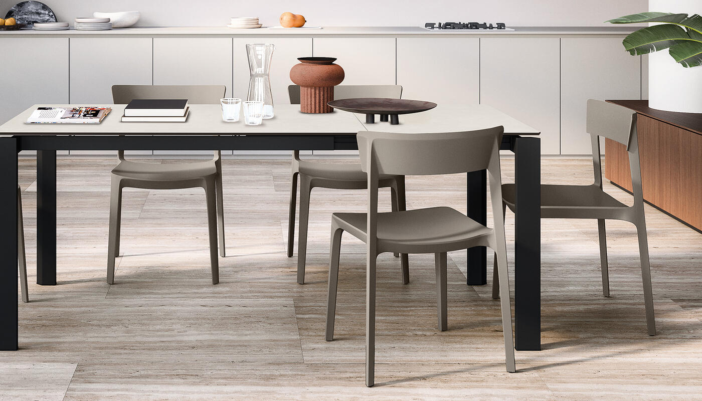 Skin Stackable plastic chair with open back | Calligaris